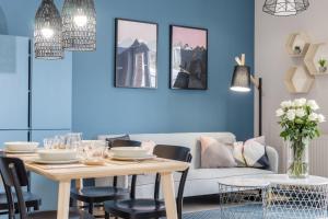 Posedenie v ubytovaní Elite Apartments City Center Suites