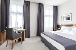 Posteľ alebo postele v izbe v ubytovaní Jakubowy Hotel