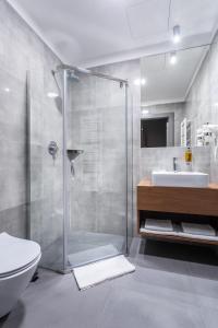 Kúpeľňa v ubytovaní Jakubowy Hotel