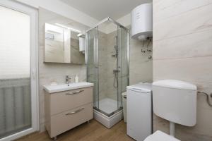 Kúpeľňa v ubytovaní July Apartment + 29 fotografií