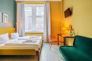 Katil atau katil-katil dalam bilik di Hotel BELLEVUE am Kurfürstendamm