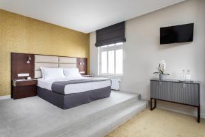 Posteľ alebo postele v izbe v ubytovaní Jakubowy Hotel