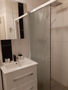 Kúpeľňa v ubytovaní Emerald Luxury Apartments