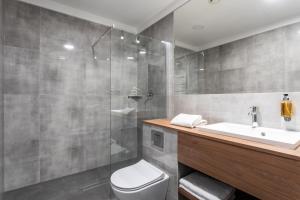 Kúpeľňa v ubytovaní Jakubowy Hotel