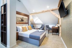Кровать или кровати в номере Jakubowy Hotel