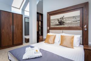 Posteľ alebo postele v izbe v ubytovaní Jakubowy Hotel