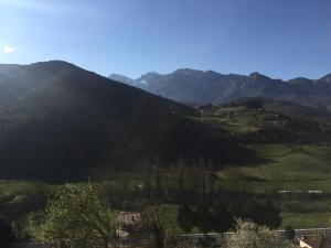 a view of a valley with mountains in the background at Mirador De Picos in Aliezo +33 photos