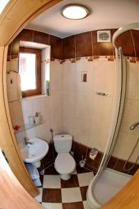 Koupelna v ubytování Gucio Domek Gościnny + 4 fotografie