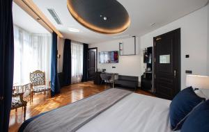 Posteľ alebo postele v izbe v ubytovaní Palacete Colonial