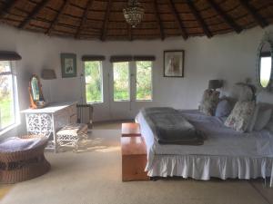 Katil atau katil-katil dalam bilik di Beacon Vlei Guest farm