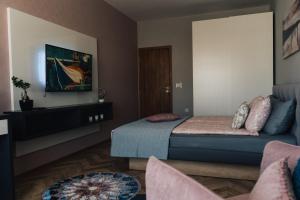 Postel nebo postele na pokoji v ubytování Apartment K