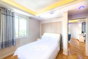 Postel nebo postele na pokoji v ubytování Riverside Hotel + 37 fotografií