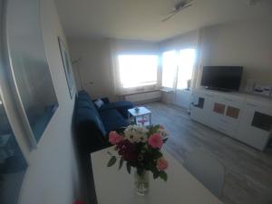TV a/nebo společenská místnost v ubytování Grömitz am Meer + 2 fotografie