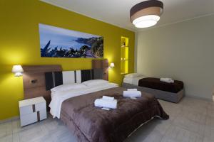 Posteľ alebo postele v izbe v ubytovaní B&B Al Duomo Milazzo