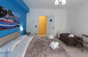 Posteľ alebo postele v izbe v ubytovaní B&B Al Duomo Milazzo