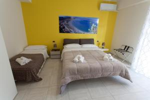 Posteľ alebo postele v izbe v ubytovaní B&B Al Duomo Milazzo