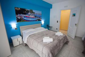 Posteľ alebo postele v izbe v ubytovaní B&B Al Duomo Milazzo