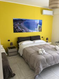 Posteľ alebo postele v izbe v ubytovaní B&B Al Duomo Milazzo