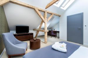 TV a/nebo společenská místnost v ubytování Jakubowy Hotel