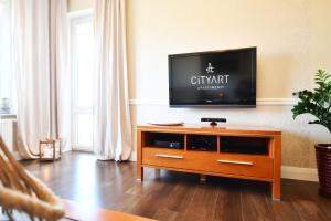 
Telewizja i/lub zestaw kina domowego w obiekcie City Art Apartamenty w Rezydencji Maritimo
