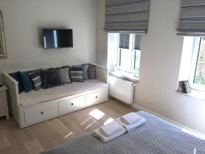 Posteľ alebo postele v izbe v ubytovaní Willa Błękit Hotel by Dorota Szelągowska