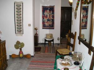 a living room with a room with a table and a room with a room at Studio next to the main Square in Zagora