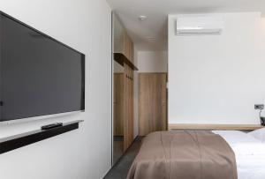 TV i/ili multimedijalni sistem u objektu 4 SMART HOTEL