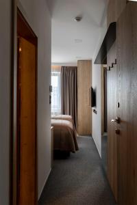 Letto o letti in una camera di 4 SMART HOTEL