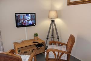 TV tai viihdekeskus majoituspaikassa Villa COLIBRI