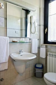Koupelna v ubytování Hotel Ai Tufi + 37 fotografií