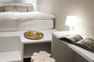 Letto o letti in una camera di CP Resort