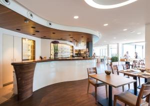 Ein Restaurant oder anderes Speiselokal in der Unterkunft Superior Hotel Nidwaldnerhof 