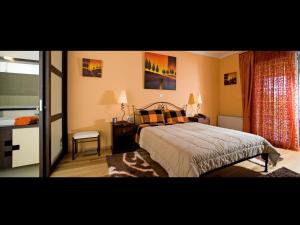 Posteľ alebo postele v izbe v ubytovaní Villa Privilege Classic & Exclusive