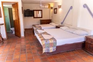 Un pat sau paturi într-o cameră la Casa Shaguibá