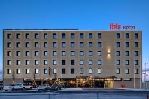 a building with aubs hotel on top of it at ibis Landshut City in Landshut