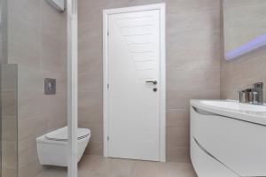 Kúpeľňa v ubytovaní Apartment Silver + 20 fotografií