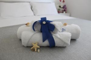 Posteľ alebo postele v izbe v ubytovaní Oudeis Holidays Apartments Tropea