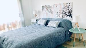 Posteľ alebo postele v izbe v ubytovaní Luxury Doña Carlota
