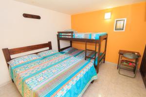 Postel nebo postele na pokoji v ubytování Hotel Marovi