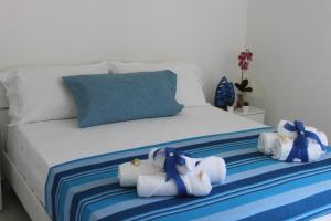 Posteľ alebo postele v izbe v ubytovaní Oudeis Holidays Apartments Tropea