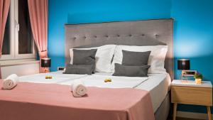 Katil atau katil-katil dalam bilik di Sun & Salt Apartments