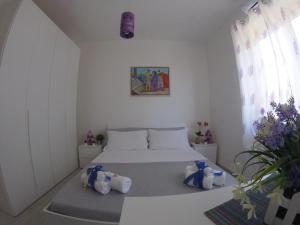 Posteľ alebo postele v izbe v ubytovaní Oudeis Holidays Apartments Tropea
