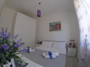 Posteľ alebo postele v izbe v ubytovaní Oudeis Holidays Apartments Tropea