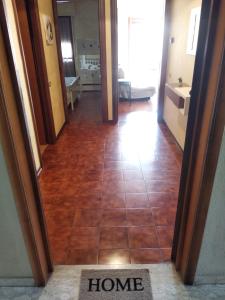 a hallway with a tile floor in a house at Appartamento da Marco in Pineto