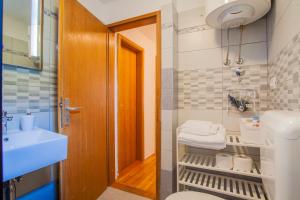 Koupelna v ubytování Room M