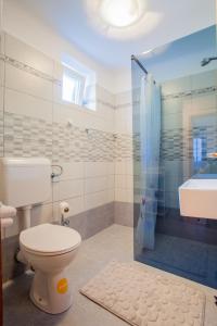 Koupelna v ubytování Room M