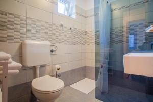 Koupelna v ubytování Room M