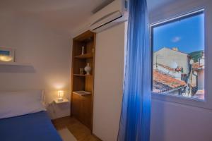 Postel nebo postele na pokoji v ubytování Room M
