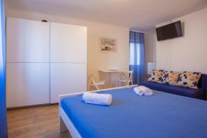 Postel nebo postele na pokoji v ubytování Room M