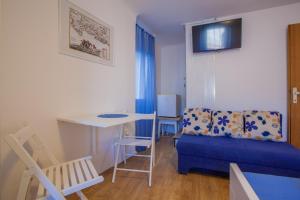 Posezení v ubytování Room M